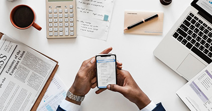 top shot of a desk spread filled with work essentials