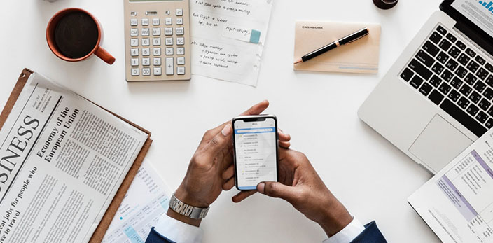 top shot of a desk spread filled with work essentials