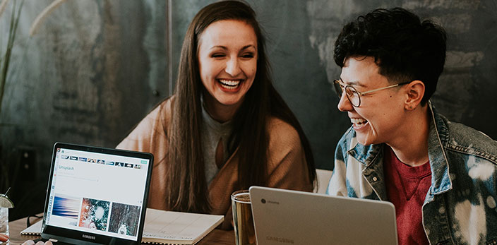 two women laughing