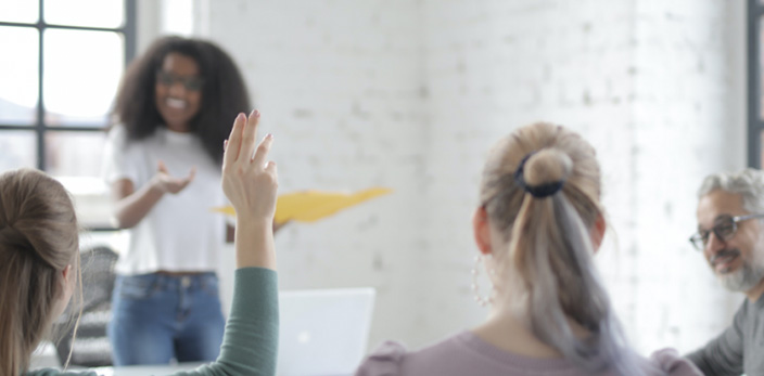 woman leading a team meeting