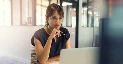 woman fully focused on learning