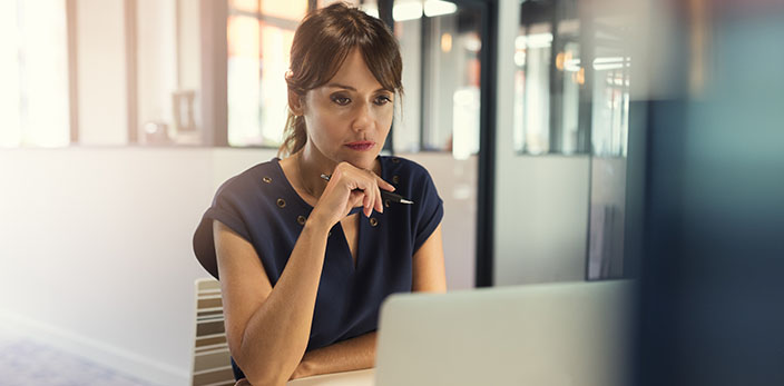 woman fully focused on learning