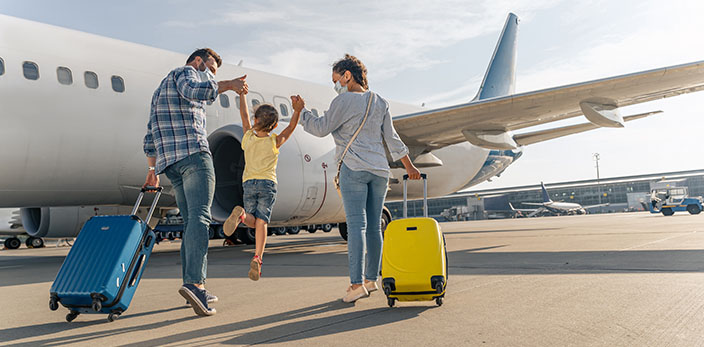 Family getting on an airplane