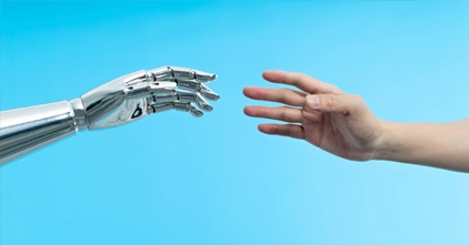 Human and AI in L&D and Assessment_Human and Robot Hands