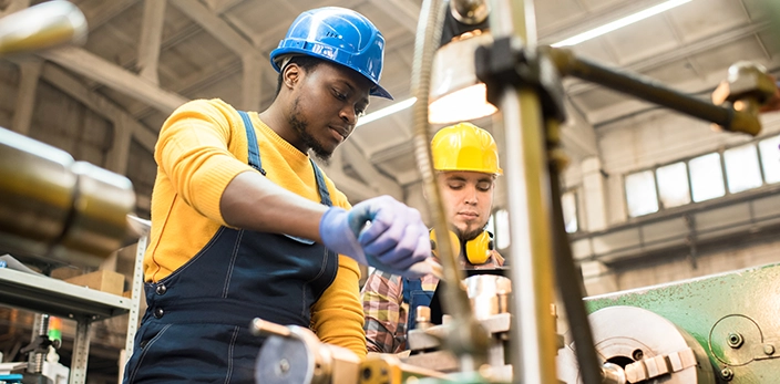 Manufacturing employees working together