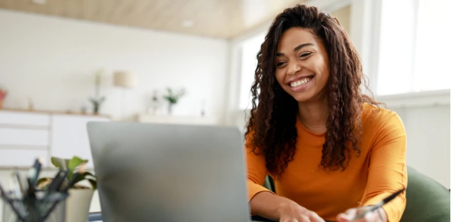 Woman learning on laptop