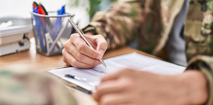 close up of military taking SLP exam