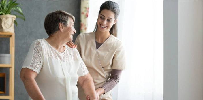 Healthcare-frontline-upskilling_704-x-347 Healthcare worker helping senior patient